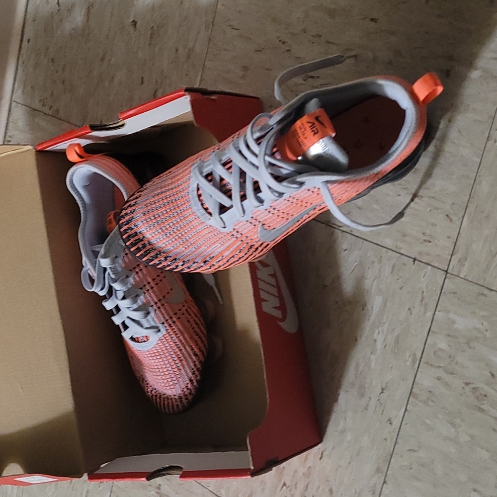 Nike Air Vapor Max sneakers.